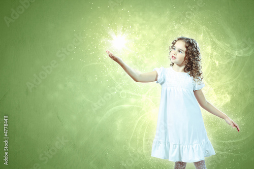 Photo: Child with magic light Child with magic light