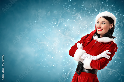 Photo: Attracive girl in santa clothes Attracive girl in santa clothes