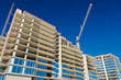 Photo: High-rise building under construction. High-rise building under construction.