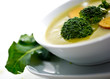 Cream soup with dried crusts isolated on white
