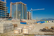 Photo: High-rise building under construction. High-rise building under construction.