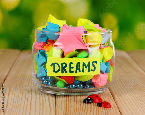 Photo: Glass vase with paper stars with dreams Glass vase with paper stars with dreams