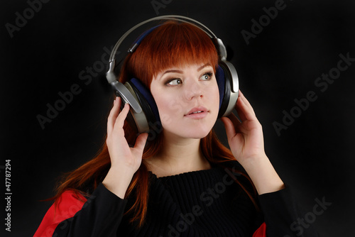 Photo: redhead girl listening music redhead girl listening music