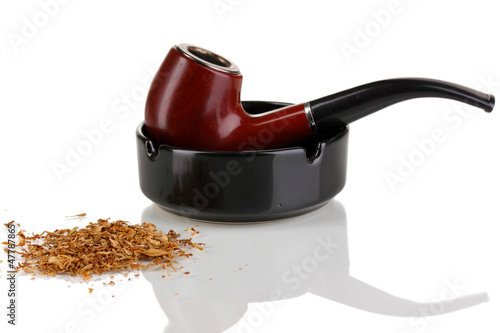 Photo: Smoking pipe and tobacco isolated on white Smoking pipe and tobacco isolated on white