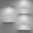 Empty shelfs illuminated by spotlights