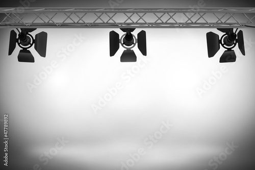 Illustration: Spotlights illuminating a stage Spotlights illuminating a stage