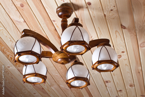 Photo: wooden chandelier on the ceiling wooden chandelier on the ceiling