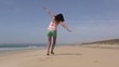 female flying at beach 45