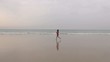female running on seashore