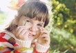 Little Girl Outdoors on Sunny Day