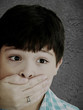 Scared 8 year old boy being abused or abducted by adult female.