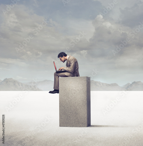 Photo: Working on a Concrete Block Working on a Concrete Block