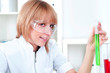 Foto: female chemist with test tube female chemist with test tube