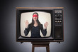 Blindfolded girl on old TV screen.
