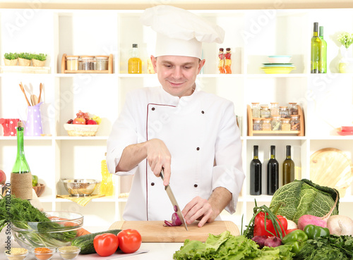 Photo: Chef cooking in kitchen Chef cooking in kitchen
