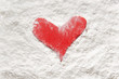 Photo: shape of a red heart in flour shape of a red heart in flour