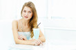 Young woman with a glass of drink