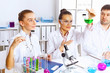 Team of scientists working in laboratory