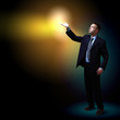 Businessman with light shining