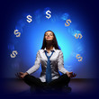 Business woman with financial symbols around