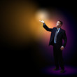 Businessman with light shining