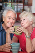 Happy Couple in Coffeehouse