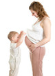 Photo: Little boy looking into pregnant mother's belly Little boy looking into pregnant mother's belly