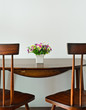 Small dining table with artificial flower pot