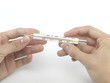 Hand with thermometer