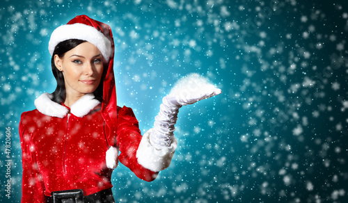 Photo: Portrait of girl wearing santa claus clothes Portrait of girl wearing santa claus clothes