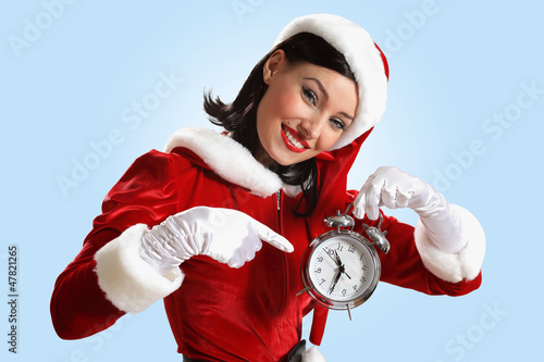 Photo: christmas girl in santa hat christmas girl in santa hat