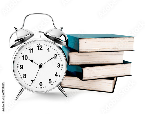 Photo: alarm clock with books isolated alarm clock with books isolated