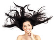 Young woman with long splayed hair. isolated