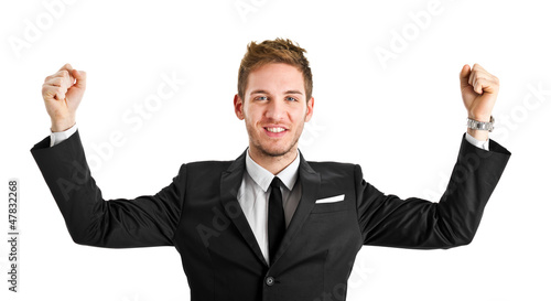 Photo: Happy businessman in a victory pose Happy businessman in a victory pose