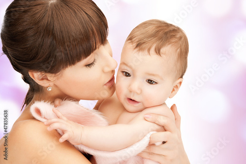 Photo: happy mother with adorable baby happy mother with adorable baby