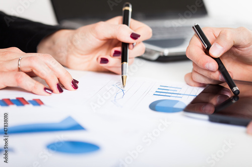 Photo: People at work during a business meeting People at work during a business meeting