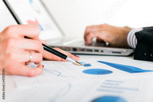 Photo: People at work during a business meeting People at work during a business meeting