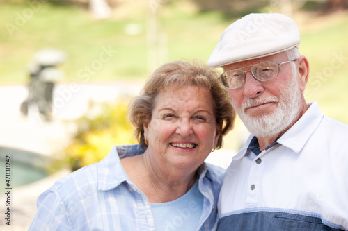 Photo: Happy Senior Couple in The Park Happy Senior Couple in The Park