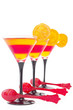 Photo: Yellow and red fruit jelly with orange slice, with red spoons, Yellow and red fruit jelly with orange slice, with red spoons,