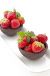 Photo: Hand made chocolate cup filled with fresh starwberry isolated on Hand made chocolate cup filled with fresh starwberry isolated on