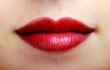 closeup of beautiful red lips of a young girl