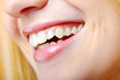 closeup of the laughing of a young woman