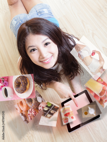 Photo: girl plan weight losing target by tablet pc girl plan weight losing target by tablet pc