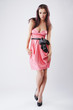 woman in the pink dress