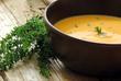Photo: Cream soup with carrot and pumpkin decorated with thyme Cream soup with carrot and pumpkin decorated with thyme