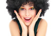 Surprised woman with afro wig