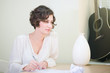 Beautiful elegant woman writing