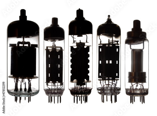 Photo: Glass vacuum radio tubes.Isolated on white background. Glass vacuum radio tubes.Isolated on white background.