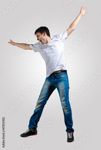 Photo: Young man dancing and jumping Young man dancing and jumping
