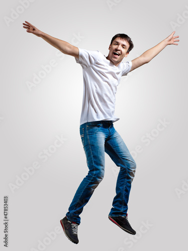 Photo: Young man dancing and jumping Young man dancing and jumping
